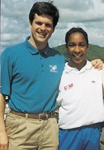 Loretta and Timothy P. Shriver smiling side by side outdoors