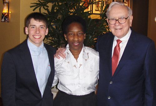 Loretta with Warren Buffett and a young man
