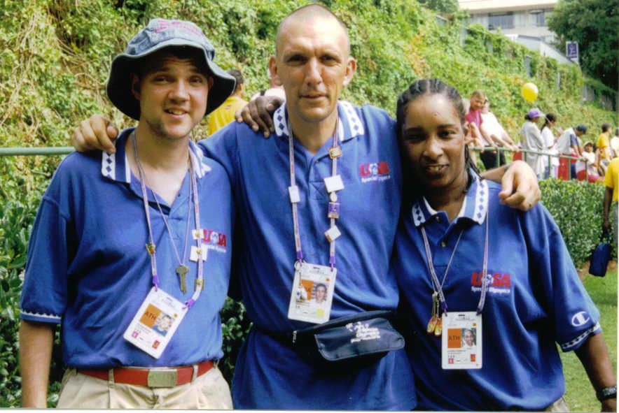 Loretta with two fellow Team USA marathon runners at the 1999 Special Olympics World Games