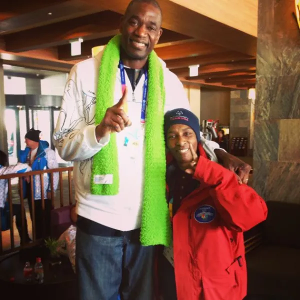 Loretta and Dikembe Mutombo giving a thumbs-up